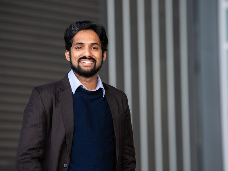 Photo of a smiling man outside