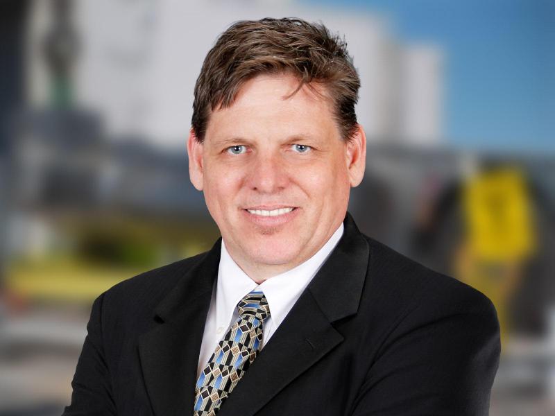 Smiling man in suit and tie