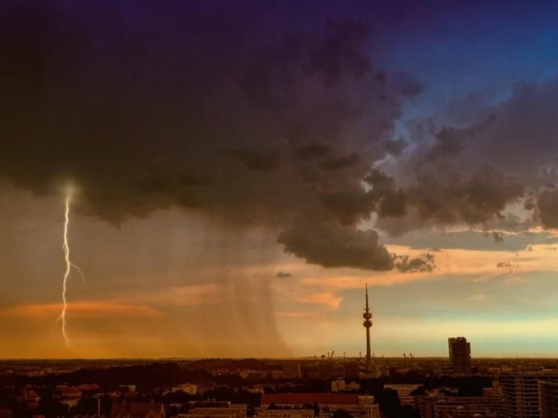 An image of a rain cloud over a city