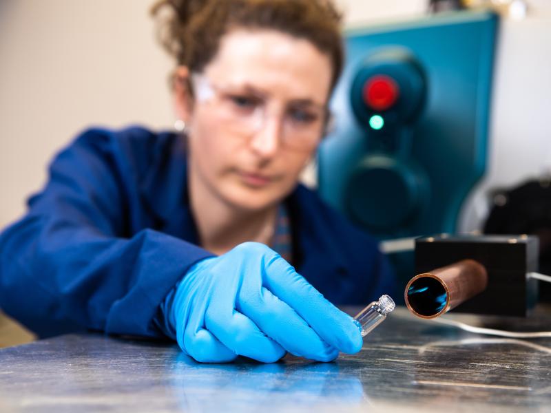 Chemist Elizabeth Denis demonstrates PNNL’s Vapor ID technology, which, when coupled with a mass spectrometer, can identify vapors of explosives and narcotics in the air, in real time, at levels previously undetectable by any other sampling technology. 